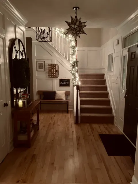 I love our entryway done up for the holidays