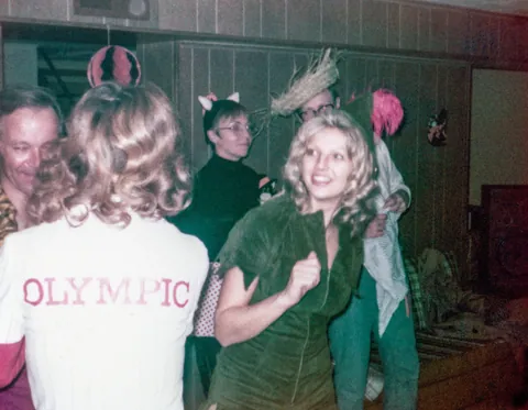 My parents at a Halloween party in 1974. My mom is dressed as Peter Pan and my dad, who can be seen in the last photo, is supposed to be Captain Hook.