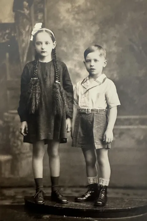 1938, my dad (Frank) and his sister (Olga). He’s 5 and she’s 6-7