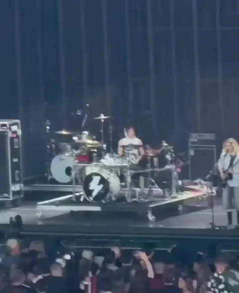 This security guy vibing at a concert