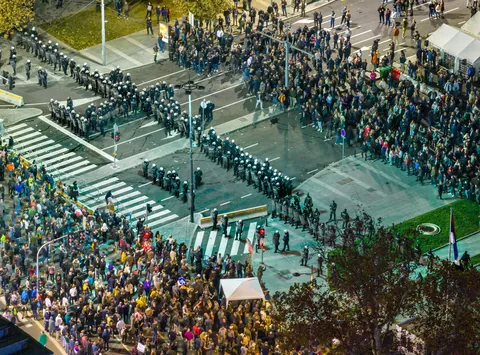 A tense stand-off between anti-govt. protestors on one side, and the police and pro-govt. forces on the other