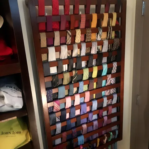 I couldn’t find the right pre-made tie-rack for my new closet, and then a neighbor was throwing out this old baby crib.... super easy life hack for behind the closet-door tie storage, really easy &amp; FREE. I cut off the ends with a miter box and used them for the wall-spacers.