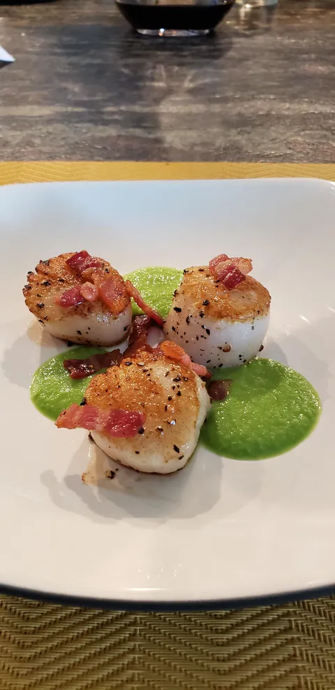 Holy Crap. My 18yo son just made me seared scallops with a pea puree and carmelized bacon for my 49th Birthday. 1st course!