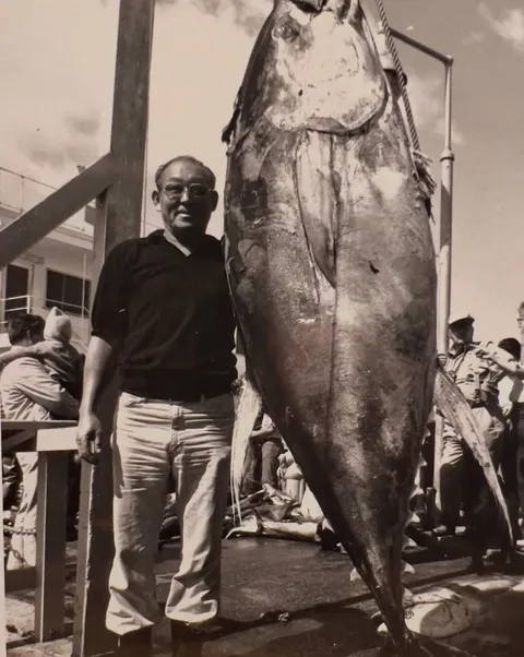 My Grandpa and a giant tuna he caught in 1977.