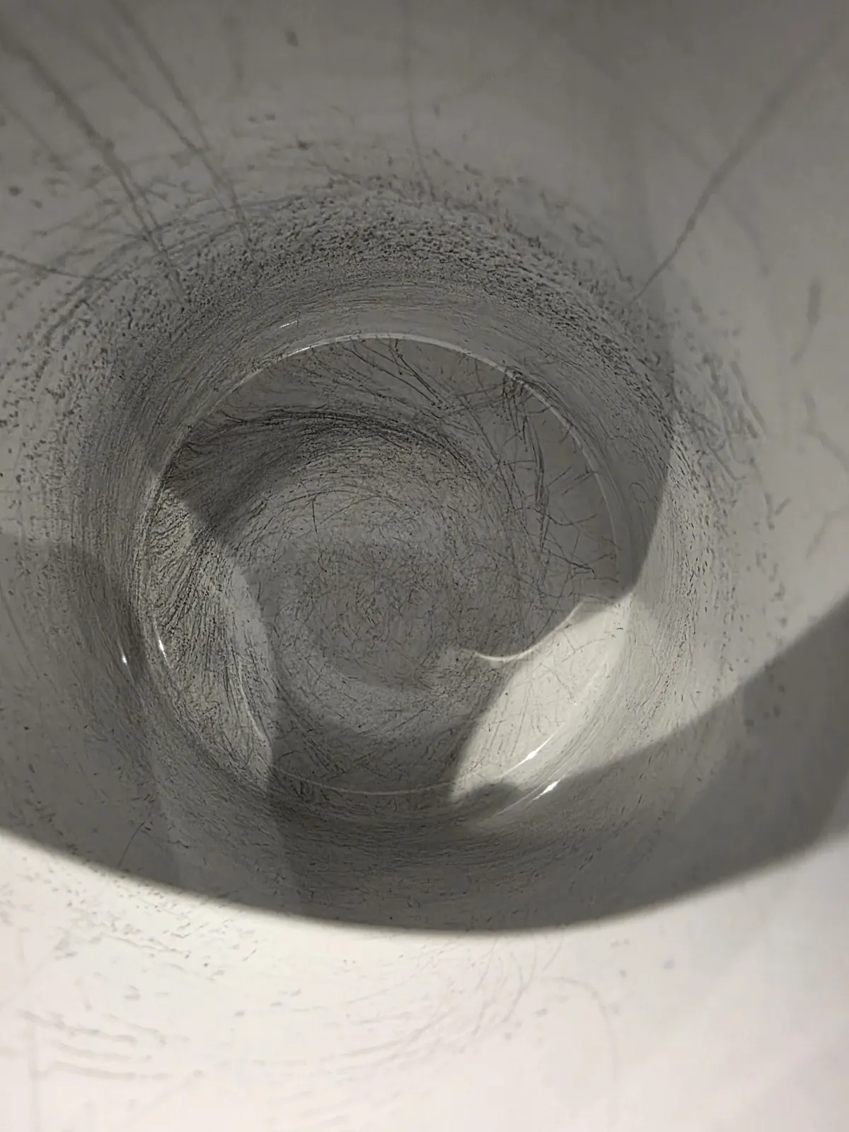 The pattern left in my dad's mug after 4 years of stirring.