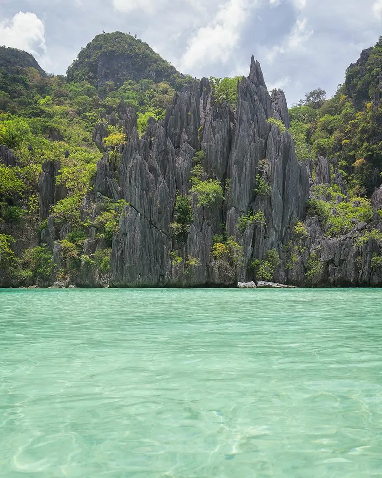 A year ago I haven't even heard of this place, now I am here thanks to Reddit. Cadlao Island, Palawan, Philippines. [OC][864x1080]