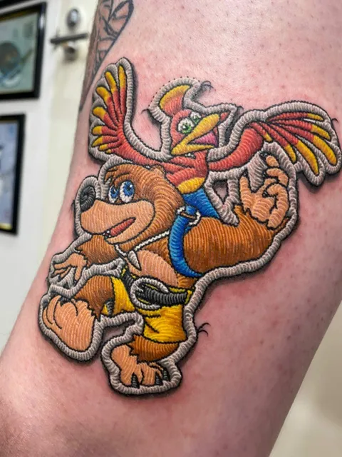Patchwork style Banjo Kazooie tattoo. Done at Authentic Ink Sydney by min