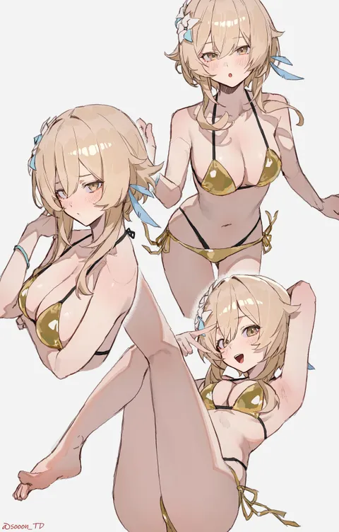 Poses in a golden bikini