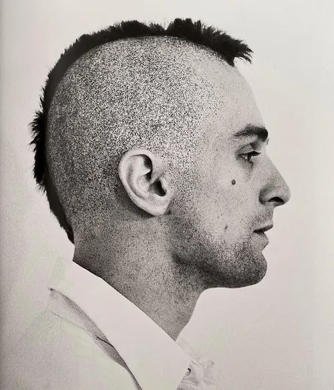 It was a wig! I never knew that.