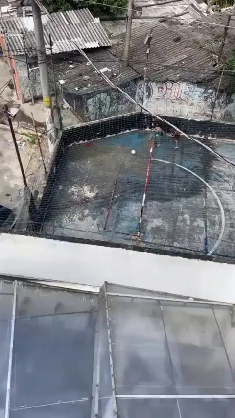 Rich kids and poor kids playing football in Brazil