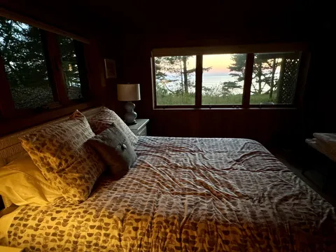 Cozy Cabin Bedroom During Lake Michigan Sunset