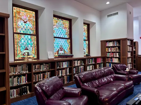 Reading under stained glass at my local library