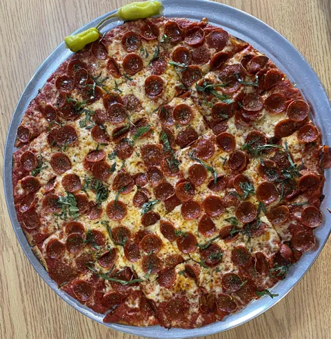 [I ate] a pepperoni pizza with basil and hot honey 