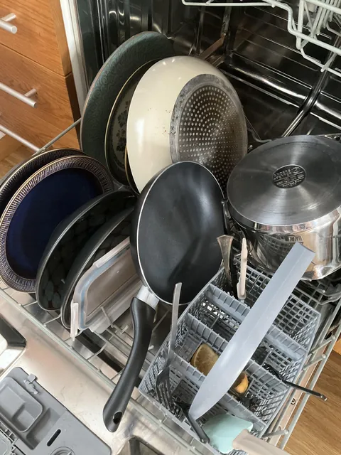 I’ve explained that our two nonstick pans do not go in the dishwasher, yet here they are.