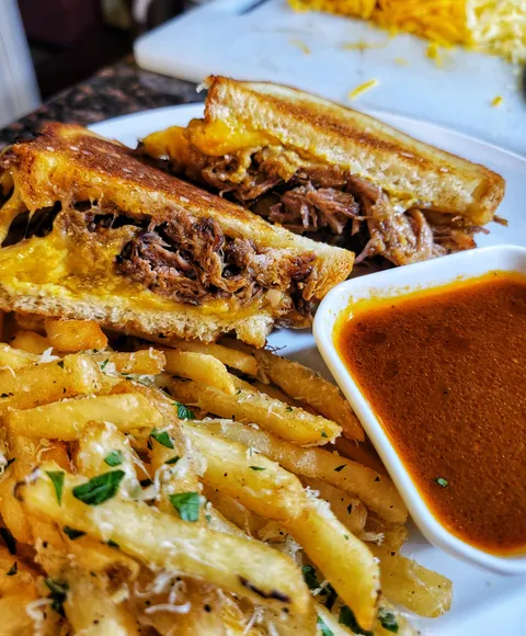 I made a short rib grilled cheese, au jus, and garlic parmesan fries with truffle oil.