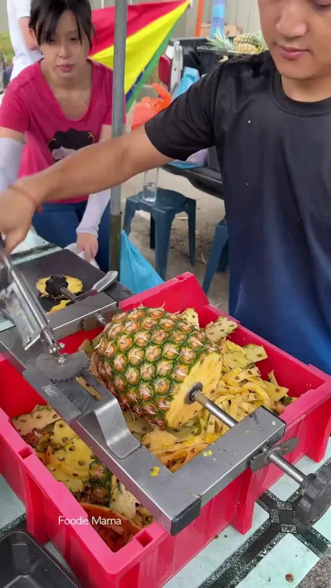 Cutting a pineapple