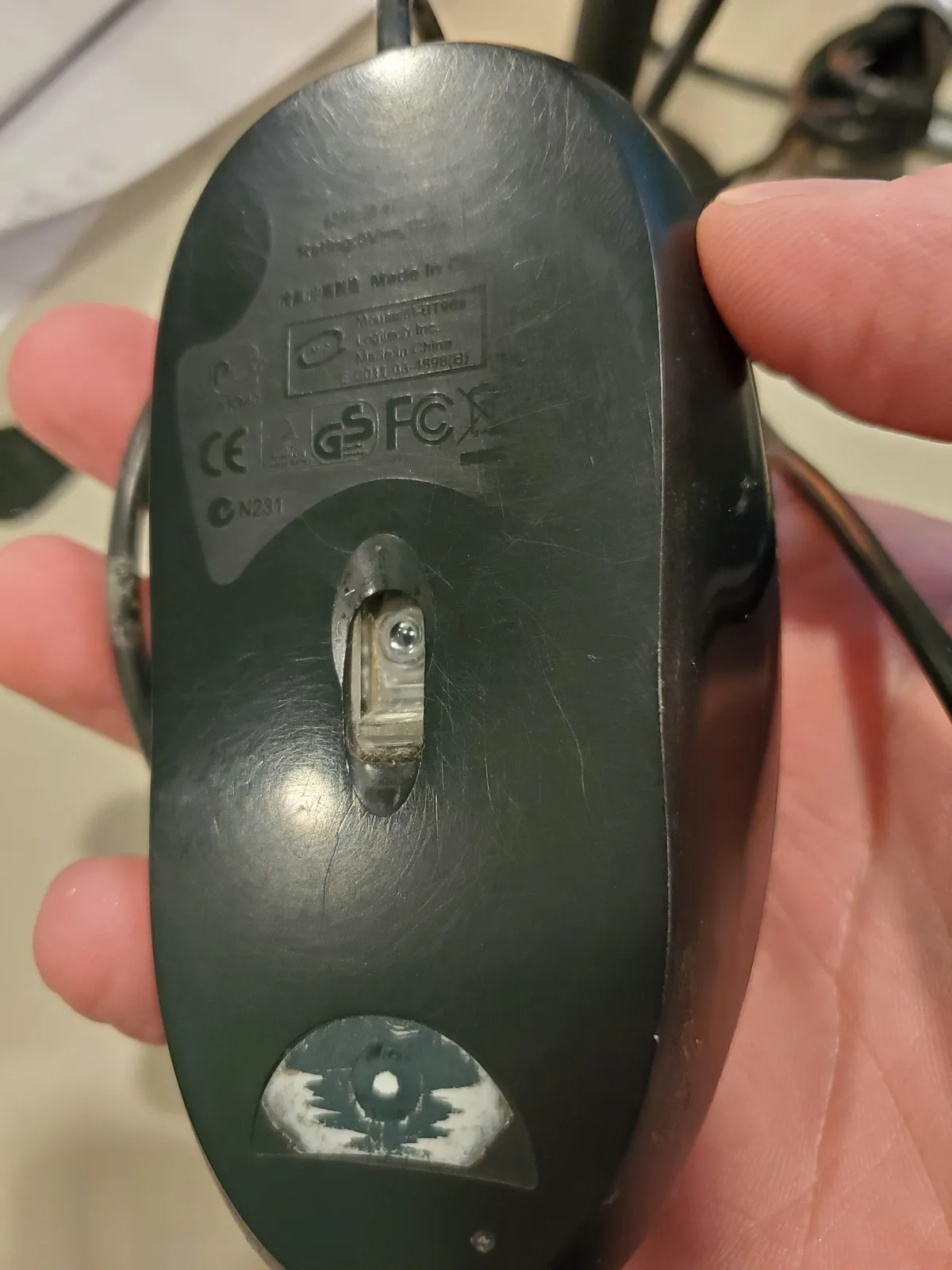 Goodbye old friend: my mouse died today...I've had it so long it's almost worn completely smooth.