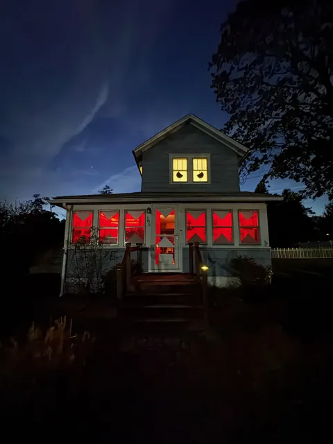 My buddy turned his house into a Jack-o'-lantern.