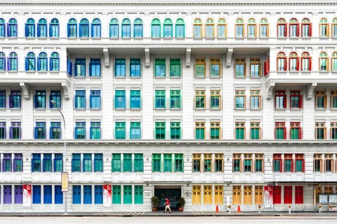 ITAP of a man walking down the street in Singapore.