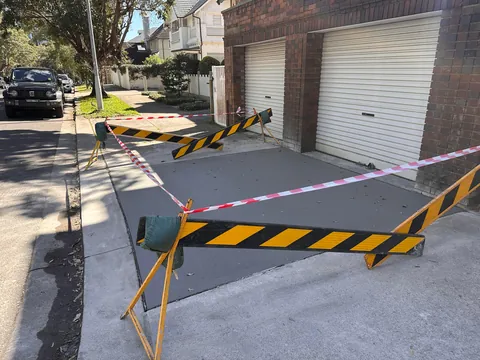 [Update] The hole is filled in, now waiting for the concrete to dry to get my car out