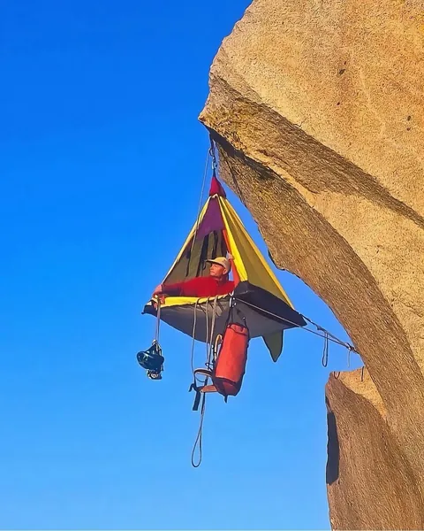 hanging “beds” are called portaledges.. collapsible platforms used by climbers during multi-day ascents