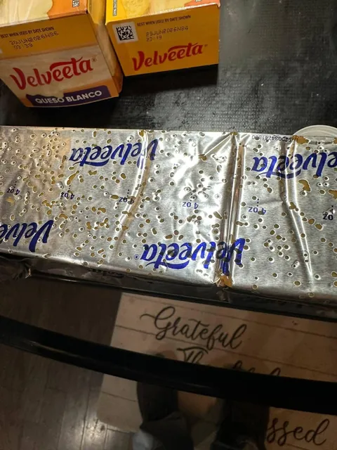 Velveeta ate through its own foil.