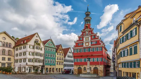 The beautiful town hall of Esslingen, Germany. The bright red front part is from the Renaissance period, the back part is from the Gothic period.