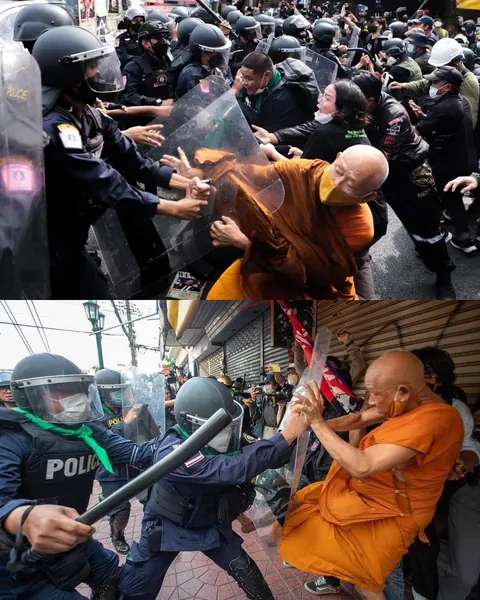 Monks clashing with police in Bangkok riots, November 2022