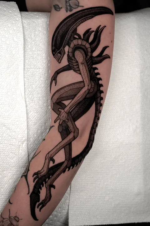 Blackwork Xenomorph tattoo done by Max LaCroix at All Sacred Tattoo Studio in Denver, CO