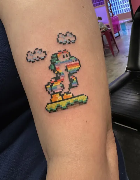 Rainbow Yoshi by Youthless at Problem Child Tattoo in Austin TX (guest spot)