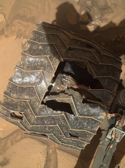 More than 11 years without tire fitting/repair. This is what one of the wheels of the Curiosity rover looks like at the moment.