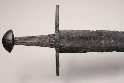 This Medieval Sword Pulled From a Dutch Riverbed Is Marked With Intricate Copper Symbols | The artifact was remarkably preserved for a millennium in anaerobic clay on a private estate near the city of Montfoort