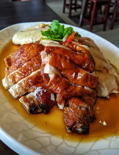 [I ate] Singaporean chicken and rice in Singapore and it was juicy delicious 