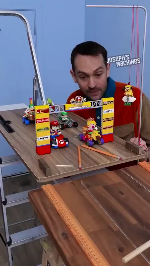 Mario Kart Rube Goldberg race! (Joseph's machines creates a real life mario kart race at home with all the quirks and features of the game)