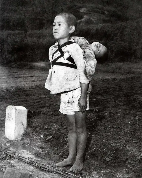 “The Standing Boy of Nagasaki” - A Silent Symbol of Love and Loss.