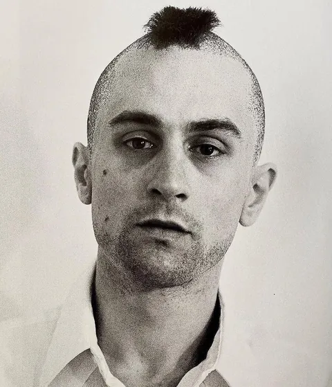 It was a wig! I never knew that.