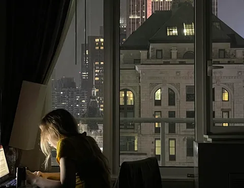 ITAP of my girlfriend doing homework in NYC.