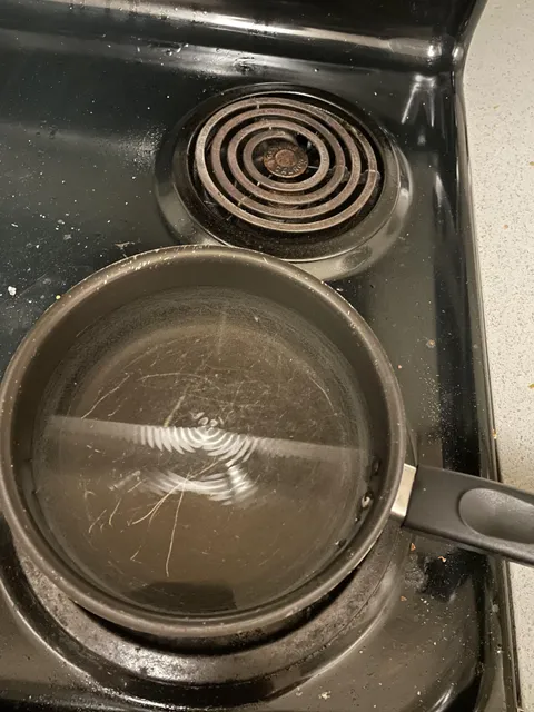 My water pot is forming perfectly centered, stationary ripples