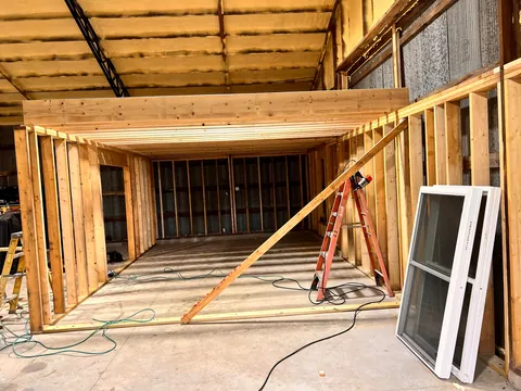 Progress from my 60+ yr old pole barn / workshop build