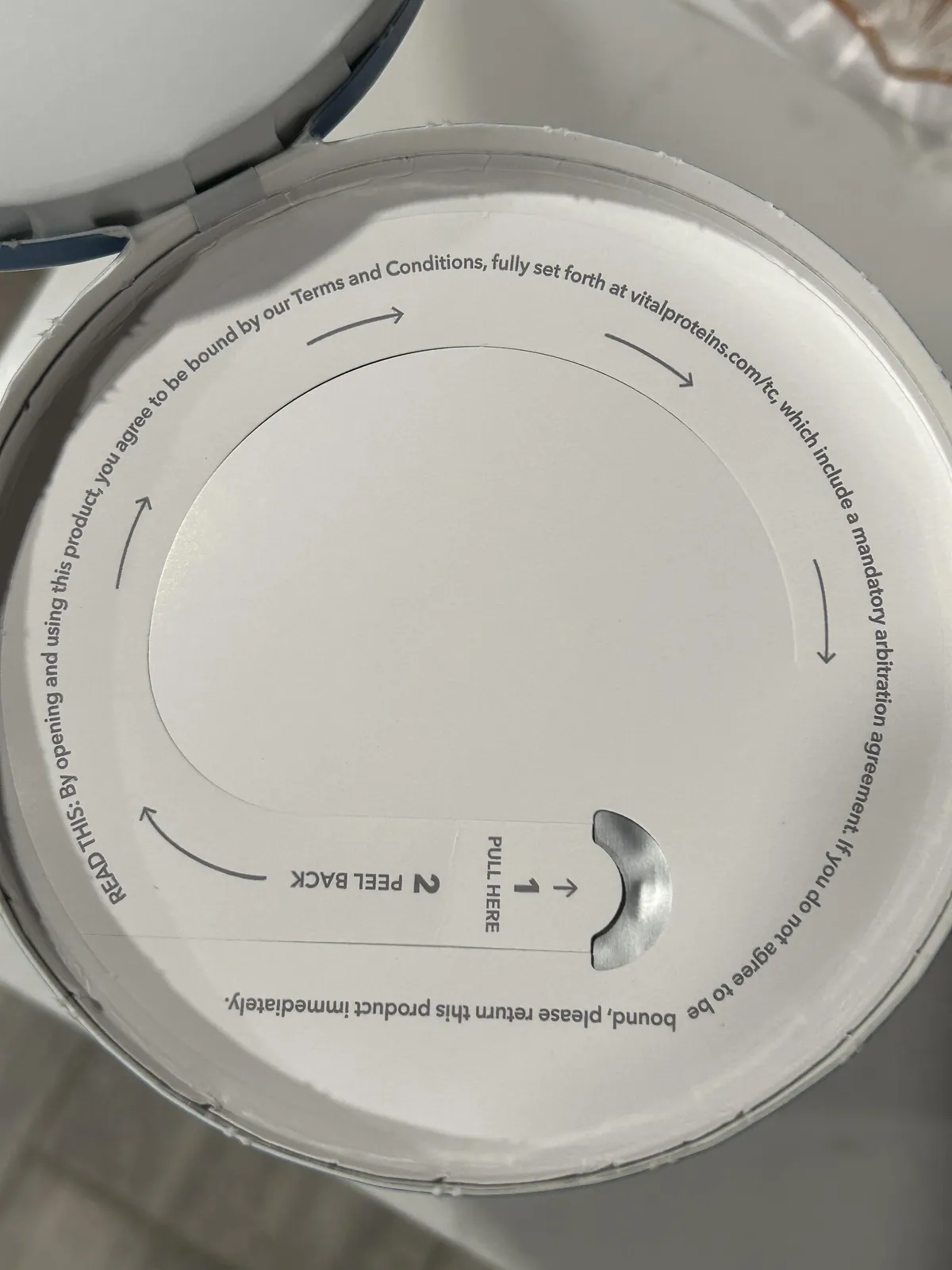 My collagen powder container has a Terms and Conditions agreement when you open the lid. 