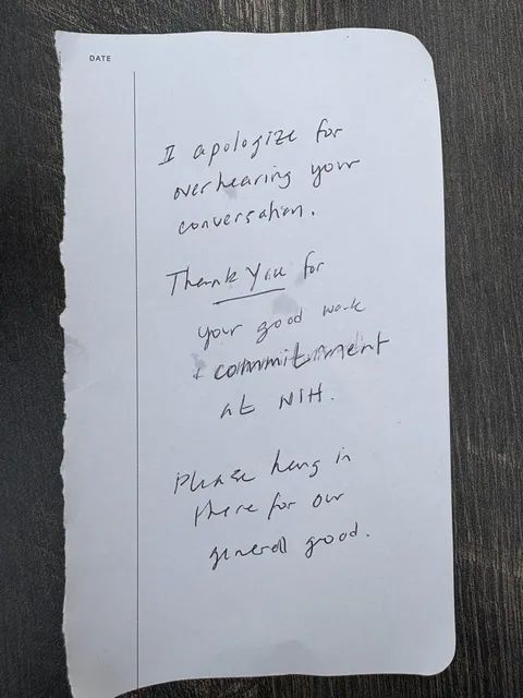 A man was overheard at dinner discussing everything going on at NIH with some friends. A stranger at the next table apparently paid for their meal and left this note.