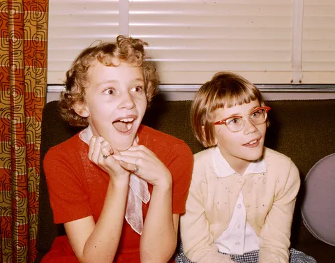 My aunt and my mom being told that my grandma was pregnant (1955)