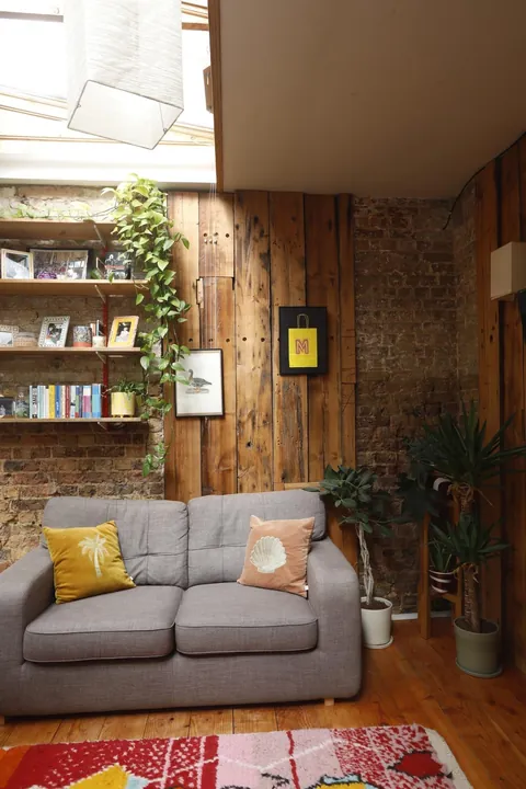 My cozy garden flat in London, featuring my fuzzy friend who slept on the roof