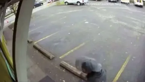 This footage shows a runaway saw blade narrowly missing Shane Reimche as he entered a convenience store.
