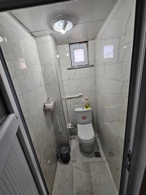 Men's vs. women's toilet at my new work office