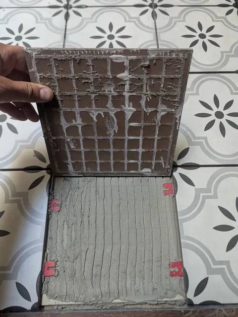 Mortar didn't adhere to tile. How screwed am I?