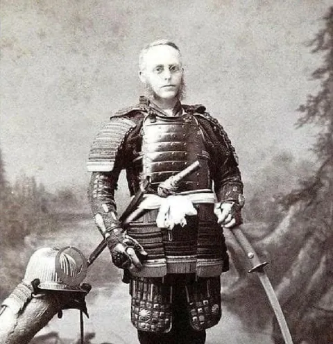 A western tourist who paid to take a photo with a Samurai armor on (1890). First weeb in history.
