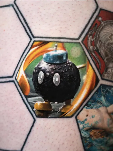 Bob-omb, by Shooby at Me kim Gus Tattoo in Paris, France