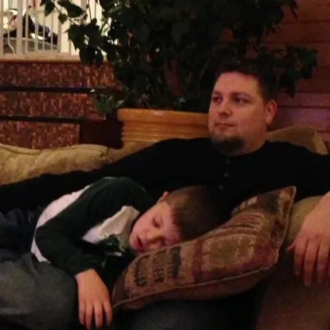 Me sleeping on my uncle's lap when I was a kid and me and my nephew many years later