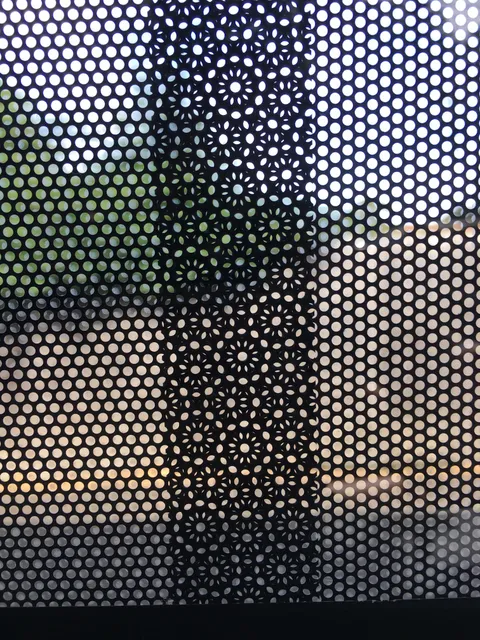 Overlapping circles on a bus window ad